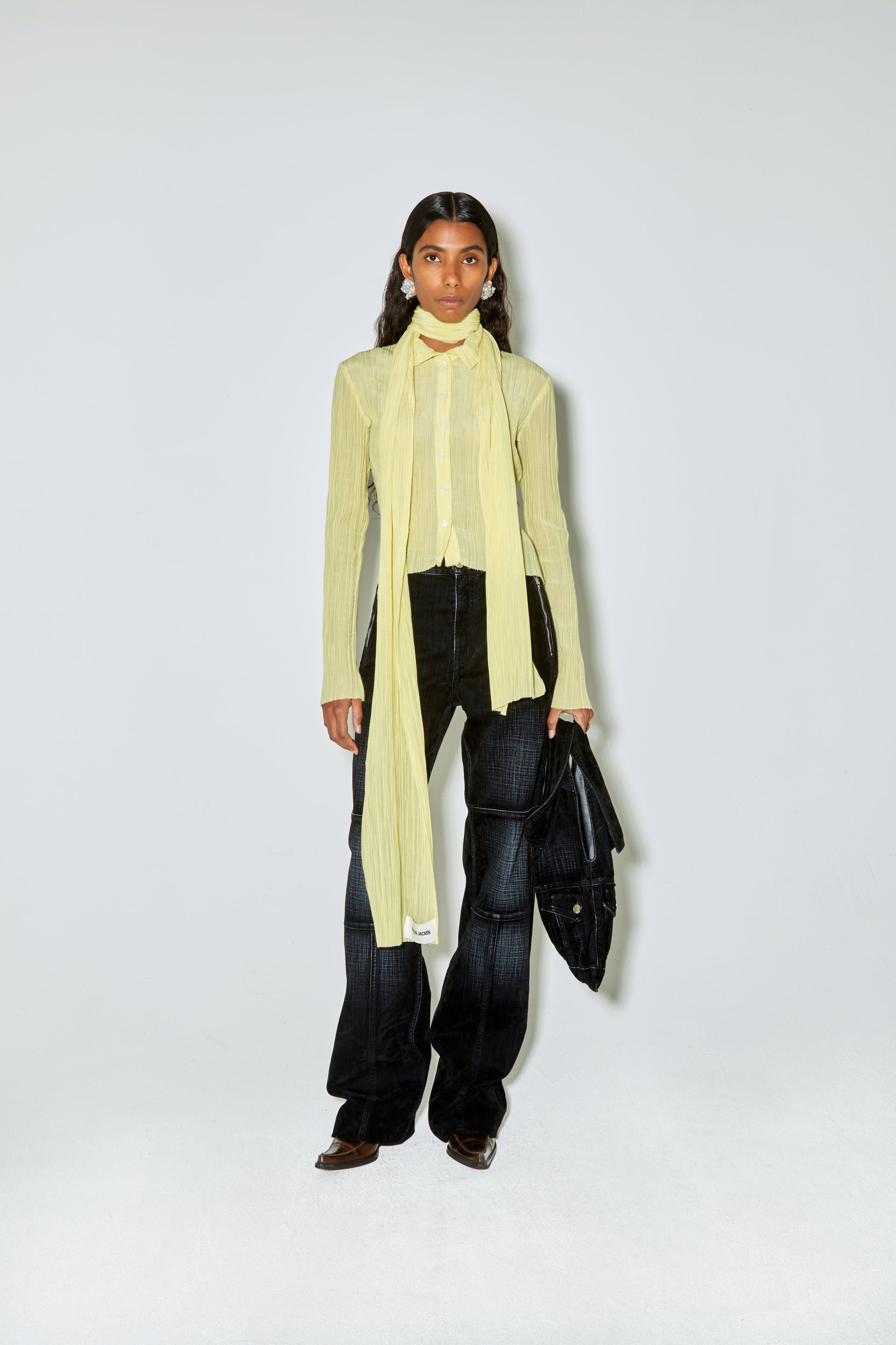 Yellow shirt black jacket on sale