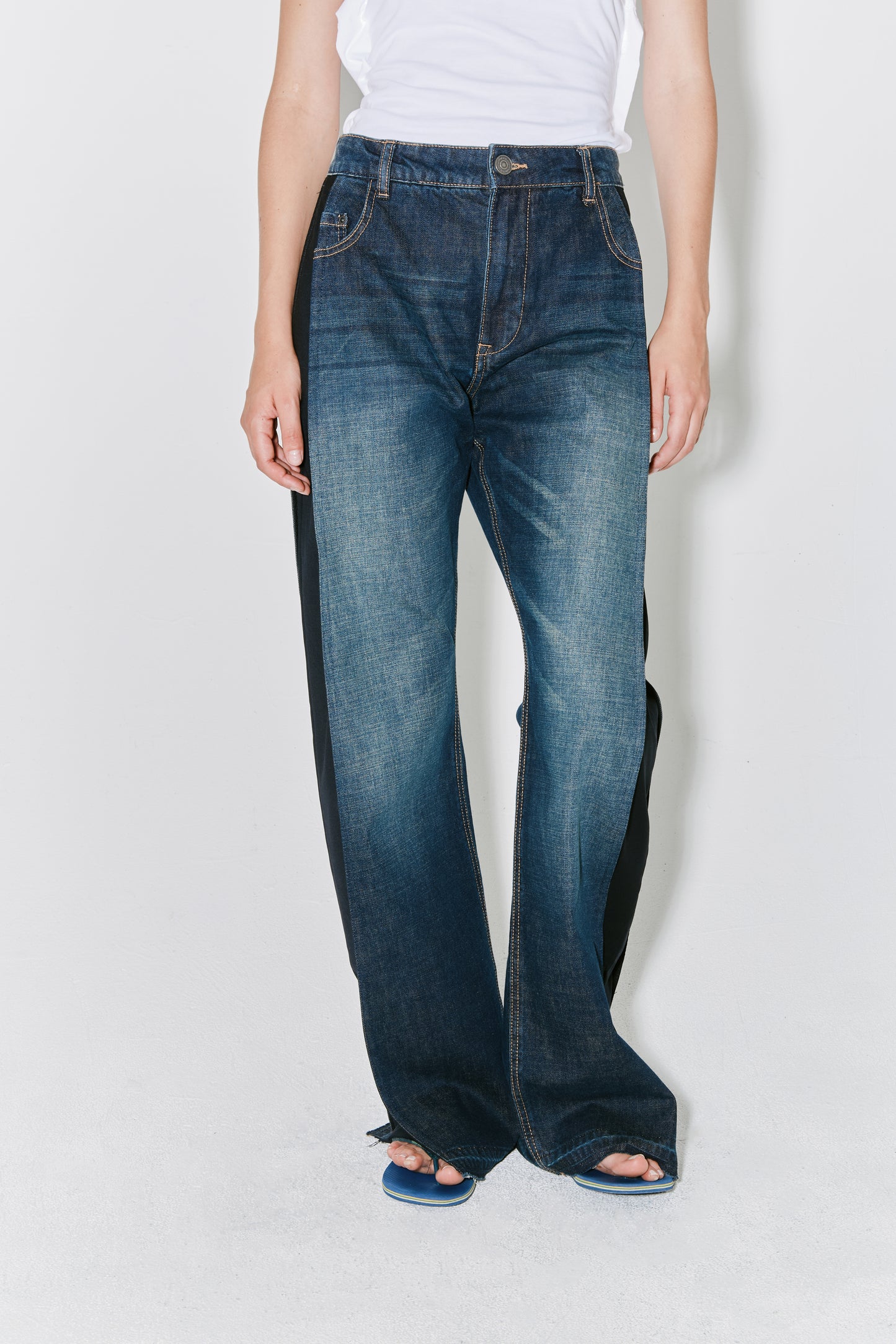 PELLA pants blue and black on side